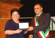 Mayor of Ragalna Avv. Vittorio Carone giving memorials